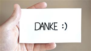 paper with the word 'Danke' written on it