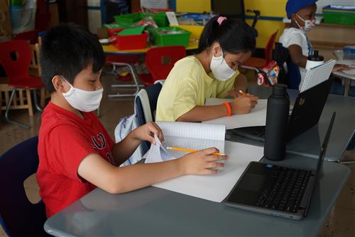 Children doing schoolwork