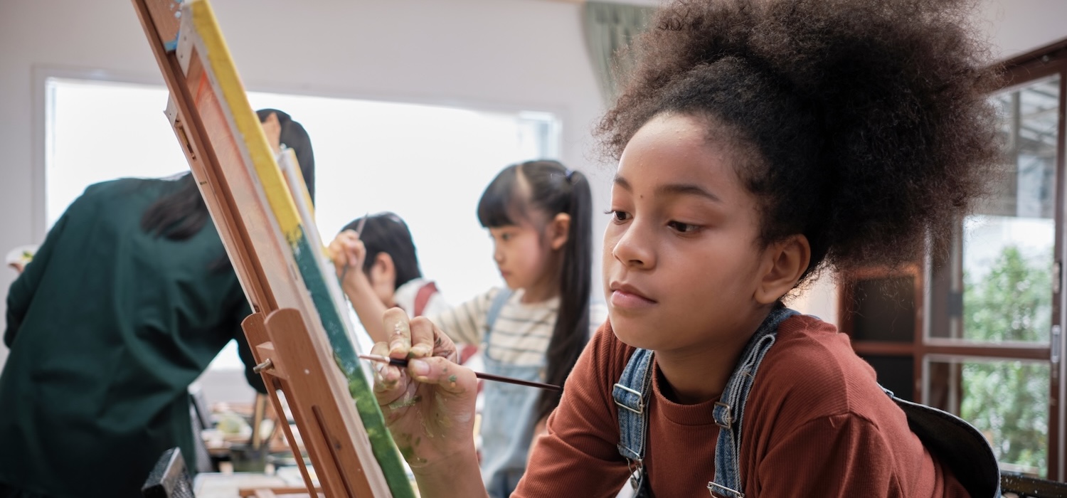 Young girl painting